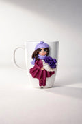 Feldspar porcelain cup with hand-modeled 3D doll figurine holding a bouquet of tulips made of polymer clay 